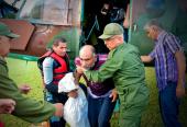 Integrantes de las Fuerzas Armadas Revolucionarias (FAR) protagonizan acciones de rescate y salvamento de personas que permanecían aisladas en zonas inundadas en Altagracia, en el municipio de Cacocum, provincia de Holguín, Cuba, el 3 de noviembre de 2025, debido al incremento del caudal del río Cauto, que remansó el agua del río Salado tras las intensas lluvias provocadas por el huracán Melissa en el oriente de Cuba. ACN FOTO/Juan Pablo CARRERAS/sdl