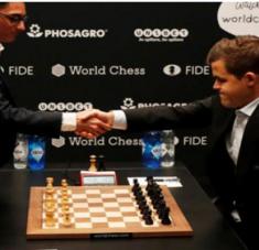Caruana (izq) y Carlsen, dos genios de los trebejos. 