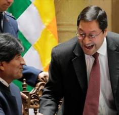 El expresidente de Bolivia Evo Morales y el candidato presidencial del MAS, Luis Arce (dcha.)