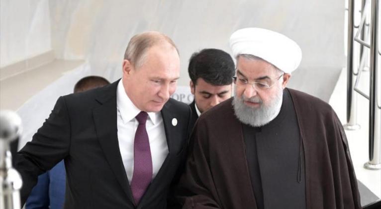 El presidente ruso, Vladimir Putin, (izq.) y su par iraní, Hasan Rohani, en una cumbre en Aktau, Kazajistán, 12 de agosto de 2018. Foto: Reuters.