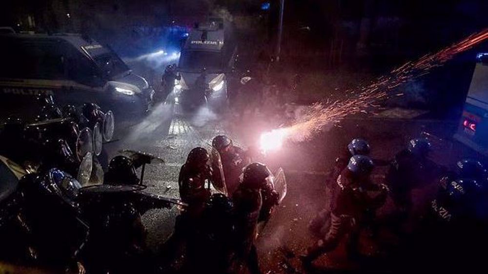 Milan police and some protesters Milan police and some protesters